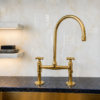 I The Artisan Gold Bridge Kitchen Faucet with Matching Side Sprayer